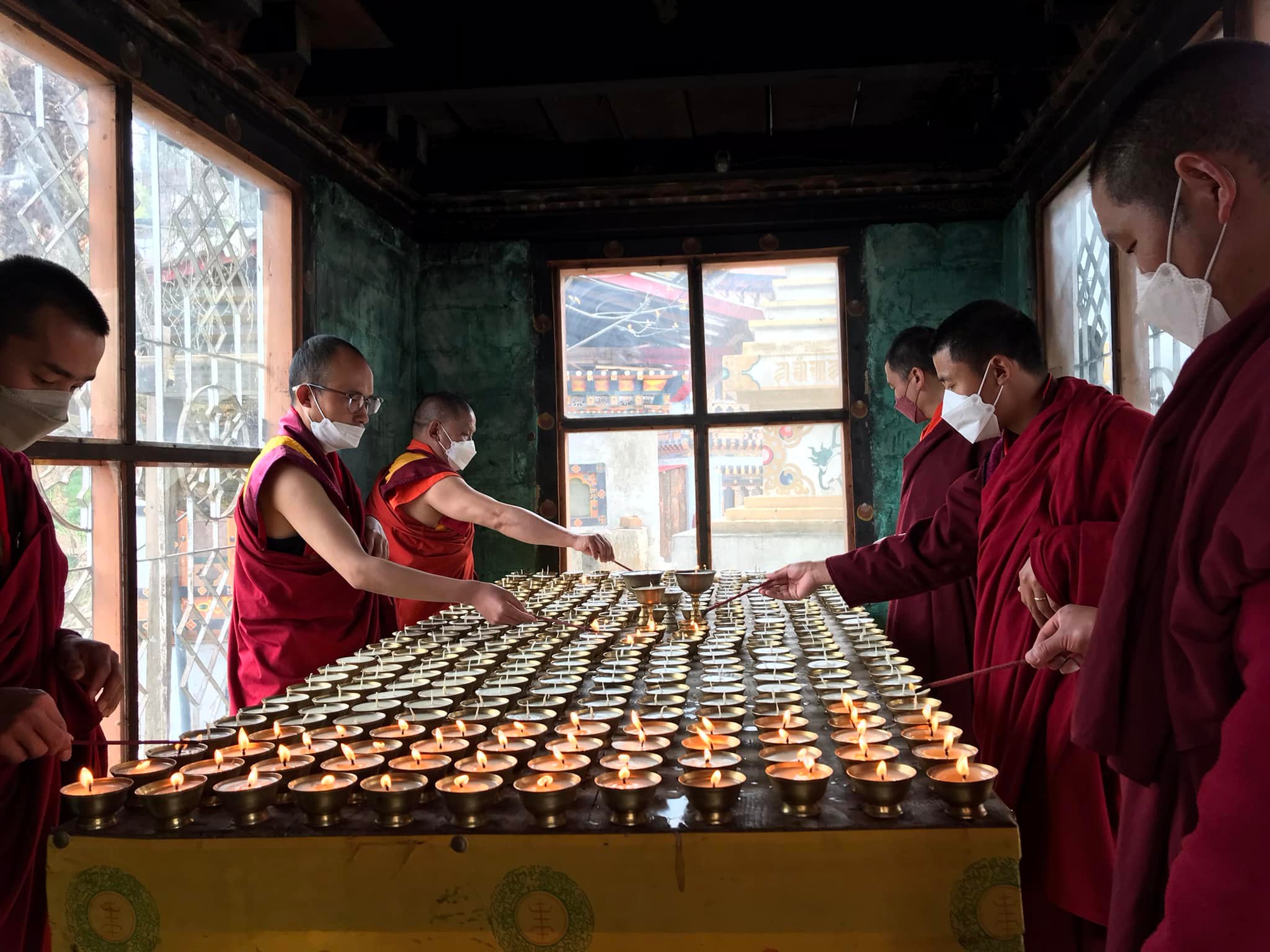  His Eminence, the Busa Trulku Khentrul Rinpoche, Khenpo, Lopens and monks of Busa Wangoen Thorim Shedra and all the Lobdra, Dratshang and Shedra under Dorji Lingpa Foundation offering Butter lamp
