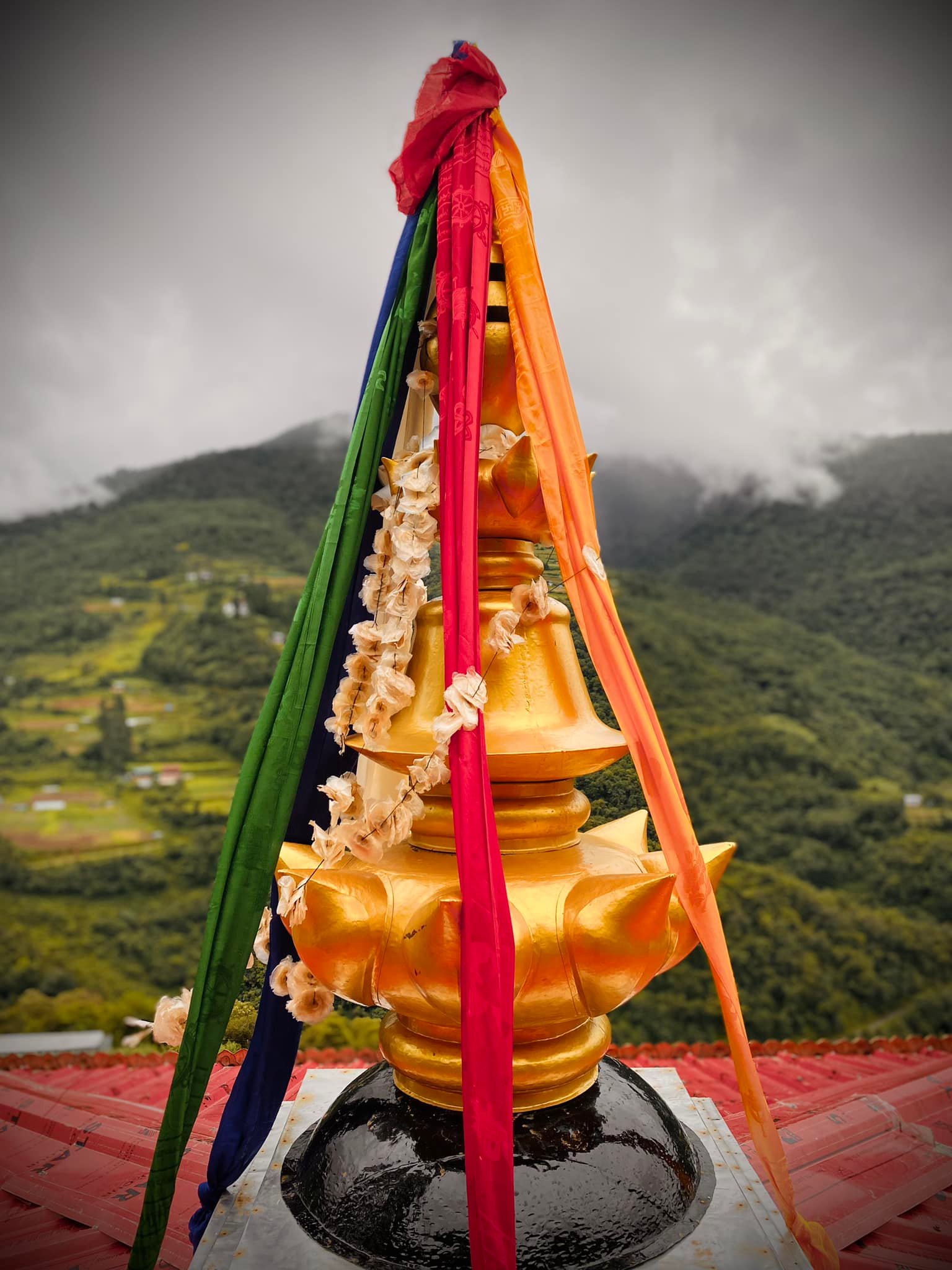 Busa Trulku Rinpoche installed the golden pinnacle (Sertho) of the newly renovated Pema Shedrup Dhargye Khandroling Nunnery, Dangchu